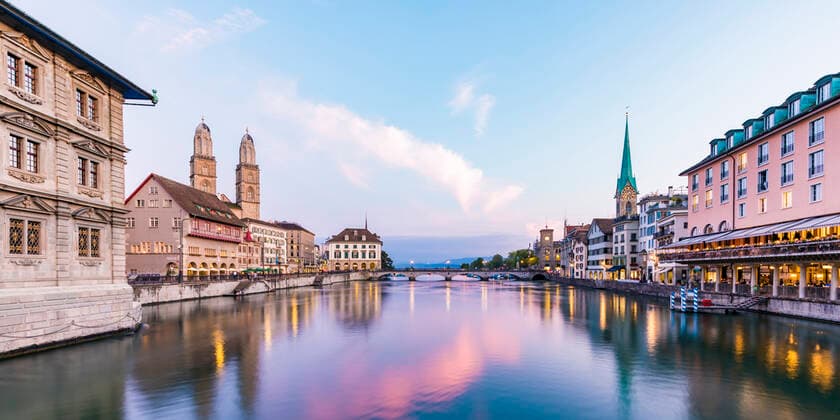 Switzerland, Canton of Zurich, Zurich, River Limmat between old town waterfront buildings at early dusk  WDF05561