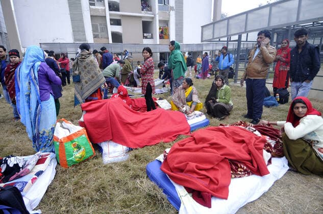 NOIDA, INDIA - JANUARY 9: Hospital patients, medical staff and visitors at the compund grounds after being evacuated from a fire incident in the basement of ESIC Hospital at Sector 24 on January 9, 2020 in Noida, India. (Photo by Sunil Ghosh Hindustan Times) Fire At Noida ESIC Hospital