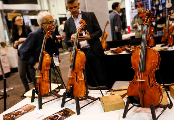 (200117) -- ANAHEIM, Jan. 17, 2020 -- People visit the National Association of Music Merchants (NAMM) Show in Anaheim, the United States, Jan. 16, 2020. The 118-year-old NAMM Show, one of the world s biggest music industry trade shows, kicked off here on Thursday. The four-day event is expected to bring together at least 110,000 people and around 2,000 exhibiting companies from more than 120 countries and regions around the world, featuring more than 7,000 brands, cutting-edge industry education, as well as exclusive special events, concerts and experiences. ) US-ANAHEIM-NAMM SHOW-OPEN LixYing