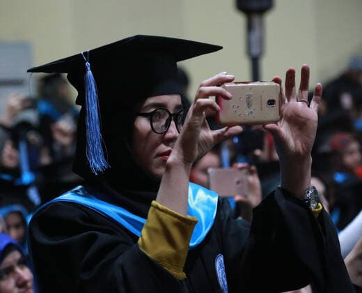 (200120) -- KABUL, Jan. 20, 2020 -- An Afghan student records with her cellphone during a graduation ceremony at Kabul University in Kabul, Afghanistan, Jan. 20, 2020. A total of 4,985 students from Kabul University attended their graduation ceremony on Monday. ) AFGHANISTAN-KABUL-GRADUATION CEREMONY-UNIVERSITY RahmatullahxAlizadah 