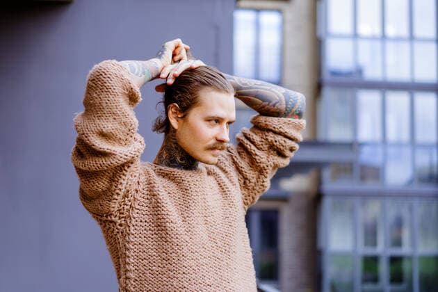 IMAGO Creative: Clickbait, Modetrends Handsome tattooed sexy man with long hair and mustache outdoors Minsk, Belarus CR_YUKI191116-241259-01