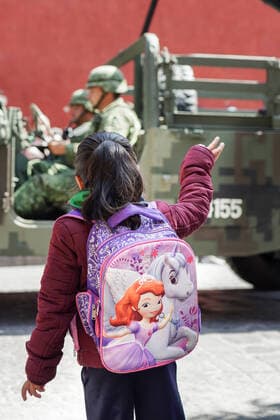 January 21, 2020, San Miguel De Allende, Guanajuato, Mexico: A young girl wearing a princess backpack waves to Mexican Soldiers during a parade to celebrate the 251st birthday of the Mexican Independence hero Ignacio Allende January 21, 2020 in San Miguel de Allende, Guanajuato, Mexico. Allende, from a wealthy family in San Miguel played a major role in the independency war against Spain in 1810 and later honored by his home city by adding his name. San Miguel De Allende Mexico - ZUMAe02_ 20200121_zaf_e02_019 Copyright: xRichardxEllisx