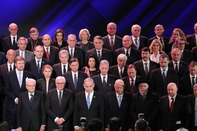 Israeli Prime Minister Benjamin Netanyahu (C-L) and Israeli President Reuven Rivlin (C-R) with world leaders pose for a group photo during the Fifth World Holocaust Forum at the Yad Vashem Holocaust memorial museum in Jerusalem, Israel, on Thursday, January 23, 2020. The event marking the 75th anniversary of the liberation of Auschwitz under the title Remembering the Holocaust: Fighting Antisemitism is held to preserve the memory of the Holocaust atrocities by Nazi Germany during World War II. Pool  JERX20200123227 ABILxSULTAN