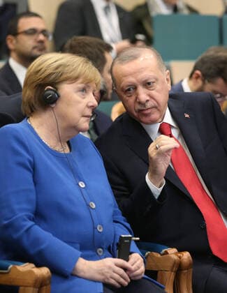 (200124) -- ISTANBUL, Jan. 24, 2020 -- German Chancellor Angela Merkel (L) attends the opening ceremony of the Turkish-German University with Turkish President Recep Tayyip Erdogan in Istanbul, Turkey, Jan. 24, 2020. Merkel on Friday said her country appreciates Turkey s efforts in hosting millions of Syrian refugees on its soil. (Turkish Presidency Handout via Xinhua) TURKEY-ISTANBUL-TURKISH-GERMAN UNIVERSITY-OPENING CEREMONY XuxSuhui 