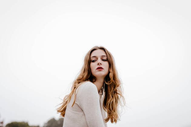 Portrait of young woman wearing white dress on a rainy day model released Symbolfoto  TCEF00017