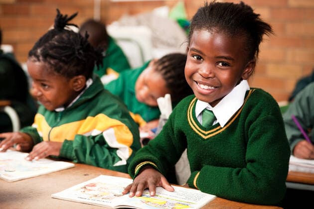 A young girl sitting at a desk in a classroom, Meyerton Primary School, Meyerton, Gauteng  Copyright: xGreatstockx O-066-0515G
