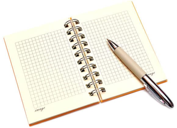 notebook open spiral bound notebook with pen on white  Copyright: xinxtix 1374174