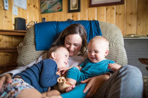 Mother affectionately holding her two children. Lac Le Jeune, BC, Canada CR_JDIP200102-245258-01