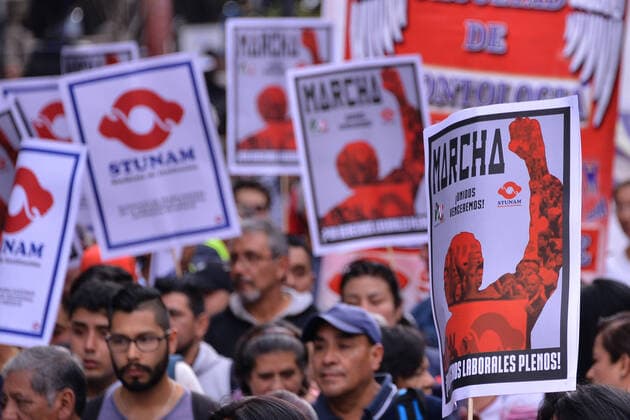 National Struggle Day protest in Mexico MEXICO CITY, MEXICO - JANUARY 31: Demonstrators take part during a march called National Struggle Day to protest for labor equality and demand labor rights and demand a job stability program during the demonstration, integrants of Union of Telephone Operators of the Mexican Republic, National Workers Union, Mexican Union of Electricians, Independent Workers Union of the Autonomous Metropolitan University participating to demand from the Federal Government a change of economic, political and social course for the country; as well as a dialogue around the Alternative Nation Project. at Reforma Avenue on January 31, 2020 in Mexico City, Mexico Copyright: xCarlosxTischlerx EYE_6290