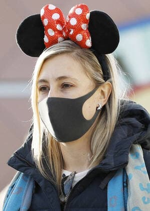 New coronavirus A woman wears a mask near Tokyo Disneyland in Urayasu, eastern Japan, on Feb. 2, 2020, amid the spreading new coronavirus. 