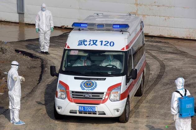 (200204) -- WUHAN, Feb. 4, 2020 -- An ambulance transfers the first batch of patients infected with the novel coronavirus to Huoshenshan (Fire God Mountain) Hospital in Wuhan, central China s Hubei Province, Feb. 4, 2020. A newly-built hospital in Wuhan, the epicenter of the novel coronavirus outbreak in China, began accepting patients infected with the virus on Tuesday. The first batch of patients are being transferred to Huoshenshan Hospital, which was delivered on Sunday after a 10-day construction. (Photo by Fan Xianhai Xinhua) CHINA-HUBEI-WUHAN-HUOSHENSHAN HOSPITAL-PATIENTS (CN) LiuxFang 