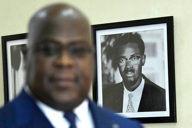 DRC Congo President Felix Tshisekedi passes by a portrait of former Congolese Prime Minister Patrice Lumumba prior to a meeting with Belgian Prime Minister Wilmes on day two of a Belgian mission to the Democratic Republic of the Congo, Thursday 06 February 2020. The Belgian Prime Minister, Foreign Minister and Minister for Cooperation Development are on a three day visit to Congo from 5 to 7 February.  POOLxBENOITxDOPPAGNEx xDIDIERxLEBRUN 2469597