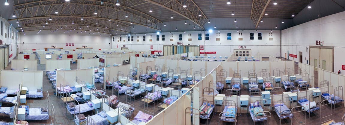 (200208) -- WUHAN, Feb. 8, 2020 -- Stitched aerial photo taken on Feb. 8, 2020 shows a view of the nursing unit B of Wuhan Livingroom in Wuhan, central China s Hubei Province. The cultural building complex dubbed Wuhan Livingroom, which is converted into a hospital to receive patients infected with the novel coronavirus, is designed to accommodate 2,000 beds. Nursing unit B of the hospital is ready, while unit A has been put into use earlier. ) CHINA-HUBEI-WUHAN-CORONAVIRUS-MAKESHIFT HOSPITAL-READY (CN) LixHe 