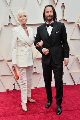 Patricia Taylor (L) and Keanu Reeves arrive for the 92nd annual Academy Awards at the Dolby Theatre in the Hollywood section of Los Angeles on Sunday, February 9, 2020.  LAP20200209650 JIMxRUYMEN