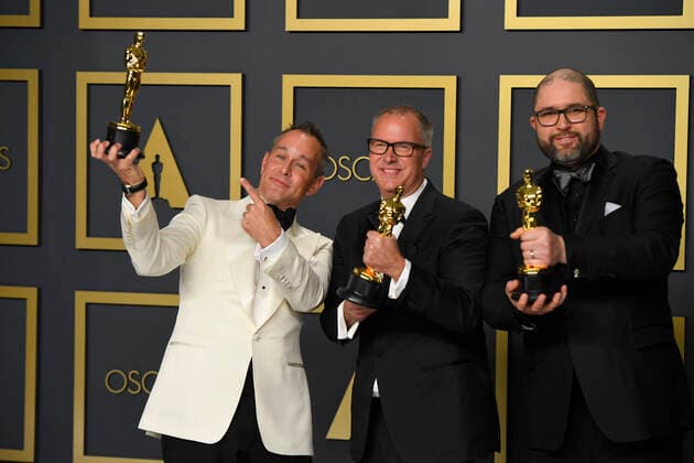 February 9, 2020, Los Angeles, California, USA: Producers JOSH COOLEY, MARK NELSON AND JONAS RIVERA pose with their Oscars for best animated film for Toy Story 4 in the Press Room during the 92nd Academy Awards, presented by the Academy of Motion Picture Arts and Sciences (AMPAS), at the Dolby Theatre in Hollywood. Los Angeles USA - ZUMAz03_ 20200209_zbp_z03_135 Copyright: xKevinxSullivanx