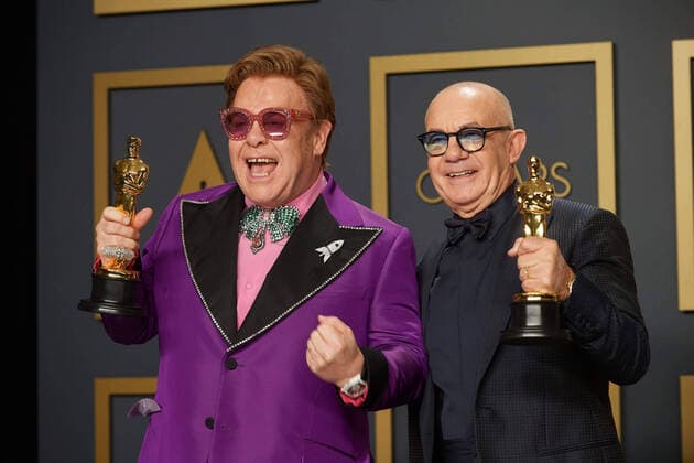 Elton John and Bernie Taupin pose backstage with the Oscar for Original Song during the live ABC Telecast of The 92nd Oscars at the Dolby Theatre in Hollywood, CA on Sunday, February 9, 2020. Los Angeles CA USA  Copyright: xNickxAgrox 339671054PLX