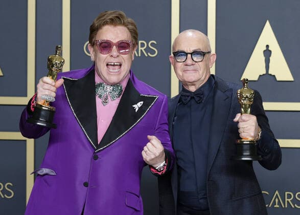 Elton John (L) and Bernie Taupin, winners of Best Original Song for (I m Gonna) Love Me Again for Rocketman, arrive backstage with their Oscars, during the 92nd annual Academy Awards at Loews Hollywood Hotel in the Hollywood section of Los Angeles on Sunday, February 9, 2020.  LAP202002091001 JOHNxANGELILLO