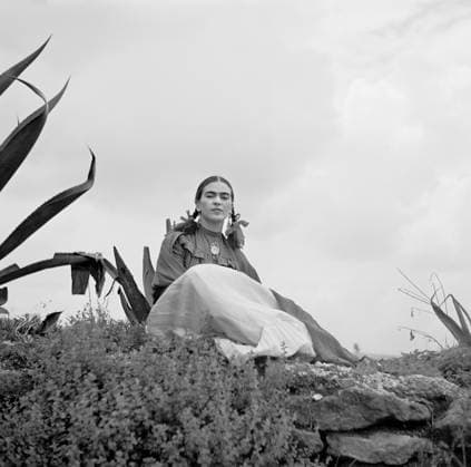 Frida Kahlo (Senora Diego Rivera) seated next to Agave Plant during Photo Shoot for Vogue Magazine, photograph by Toni Frissell, 1937  Copyright: xCircaxImagesx ghi-circa07701