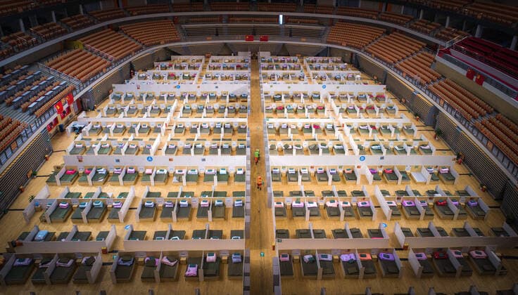 (200213) -- BEIJING, Feb. 13, 2020 -- Photo taken on Feb. 12, 2020 shows the interior of the temporary hospital converted from Wuhan Sports Center in Wuhan, central China s Hubei Province. With the fundamental facilities being set up, the temporary hospital with a total of 1,100 beds is ready to admit patients with mild symptoms caused by the novel coronavirus. ) XINHUA PHOTOS OF THE DAY XiaoxYijiu 