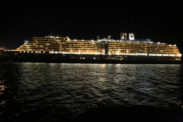 (200213) -- PHNOM PENH, Feb. 13, 2020 -- The Westerdam cruise ship is seen at the Sihanoukville Autonomous Port (PAS) in Preah Sihanouk province, Cambodia, Feb. 13, 2020. A cruise ship, which had been turned away over fears of the disease caused by the novel coronavirus, docked at southwest Cambodia s sea port of Sihanoukville on Thursday, said the port chief. (Photo by Li Lay Xinhua) CAMBODIA-PREAH SIHANOUK-CRUISE SHIP-VIRUS maopengfei 