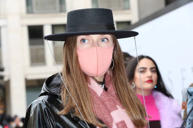 Face masks appear at London Fashion Week AW20 as coronavirus (COVID-19) fears hit numbers. Attendance is expected to be down, as the five-day event kicked off days after the virus was confirmed to have hit London. FEBRUARY 14th 2020  MDRx20456