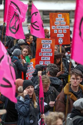 February 15, 2020, London, England, United Kingdom: Extinction Rebellion protesters on the Strand, London as part of a protest against London Fashion Week on Saturday, Feb. 15, 2020. (Photo )..Given the ecological consequences of fast fashion and the impact London Fashion Week has on consumption, the organisation says a boycott is the only way forward to help save our planet..In order to get their message across, the activists will be taking part in several protests during the five-day event in London. London United Kingdom - ZUMAx02_ 20200215_zaf_x02_001 Copyright: xVudixXhymshitix