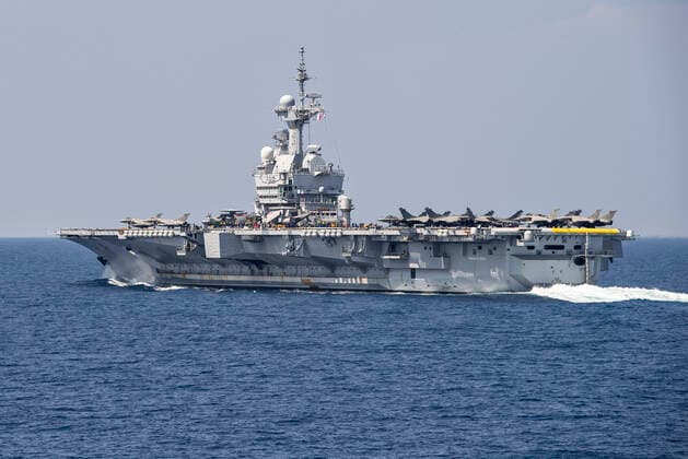 Det franske hangarskib Charles de Gaulle med Dassault Rafale M jagerfly paa daekket i Middelhavet , fredag 5. april 2019. Den daske fregat Niels Juel er en del af Task Force 473, en hangarskibsgruppe med overfladeenheder, u-baade og fly og det franske hangarskib Charles de Gaulle.. , Larnaca Cypern Denmark Copyright: HenningxBagger HenningxBaggerx COP109 spdk20200220-133831-A