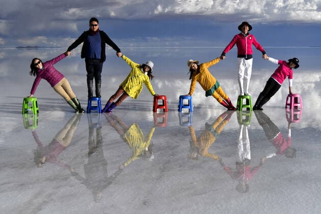 February 13, 2020, Potosi, Bolivia: Bolivian Salar de Uyuni is the world s largest salt flat, and one of the top s bolivian touristic atraction, with 10,582 square kilometers (4,086 sq mi). It is in the province of PotosoÂ­ in southwest Bolivia, near the crest of the Andes at an elevation of 3,656 meters (11,995 ft) above sea level.The crust serves as a source of salt and covers a pool of brine, which is exceptionally rich in lithium. It contains approximatively 50% to 70% of the world s known lithium reserves. However, lithium extraction in the 1980s and 1990s by foreign companies met strong opposition from the local community. Locals believed that the money infused by mining would not reach them. For tourists, it s a point of Rally Dakar and an exceptional landscape. One of the photographic move there since around 15 years is to us - ZUMAl72_ 20200213_znp_l72_004 Copyright: xChristianxLombardix