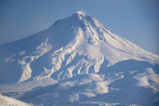 KAMCHATKA TERRITORY, RUSSIA - FEBRUARY 23, 2020: A helicopter view of Vilyuchinsky Volcano. Yuri Smityuk TASS  TS0CF685