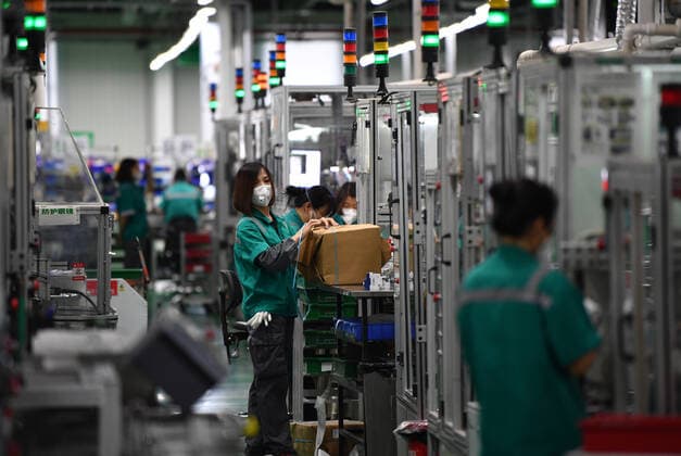 (200225) -- TIANJIN, Feb. 25, 2020 -- People work at the workshop of Schneider Electric Low Voltage (Tianjin) Co., Ltd. in Tianjin, north China, Feb. 25, 2020. The Binhai New District in Tianjin has made efforts to support foreign-funded enterprises to resume production during the fight against the novel coronavirus disease (COVID-19). ) CHINA-TIANJIN-NOVEL CORONAVIRUS-FOREIGN-FUNDED ENTERPRISES-RESUMPTION (CN) LixRan 