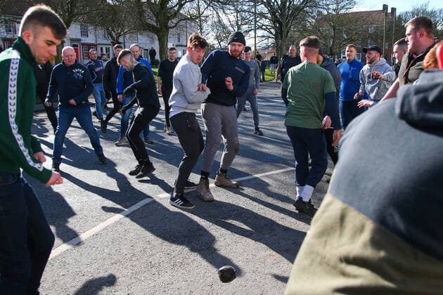 . 25 02 2020. Sedgefield, United Kingdom. The traditional Shrove Tuesday Ball Game in Sedgefield. Where a small, leather ball is chased around the village for hours.  xTomxBanksx xi-Imagesx IIM-20824-0011
