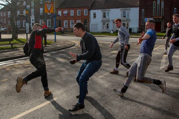 . 25 02 2020. Sedgefield, United Kingdom. The traditional Shrove Tuesday Ball Game in Sedgefield. Where a small, leather ball is chased around the village for hours.  xTomxBanksx xi-Imagesx IIM-20824-0031