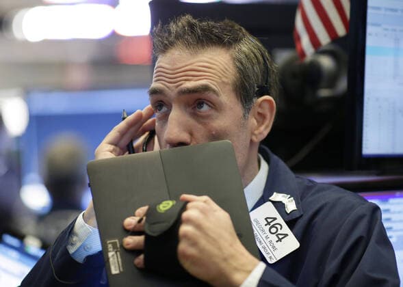 Traders work on the the floor of the New York Stock Exchange at the opening bell on Wall Street in New York City on Tuesday, February 25, 2020. Stocks fell slightly on Tuesday after a failed early attempt at recovering some of the lost ground from the Monday session which was the market s worst day in two years. Stocks fell sharply the day before with Dow Jones Industrial Average closing down over 1,000 points on possible fears from the coronavirus outbreak.  NYP20200225101 JOHNxANGELILLO