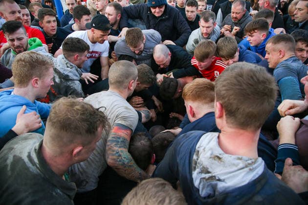 . 25 02 2020. Sedgefield, United Kingdom. The traditional Shrove Tuesday Ball Game in Sedgefield. Where a small, leather ball is chased around the village for hours.  xTomxBanksx xi-Imagesx IIM-20824-0056