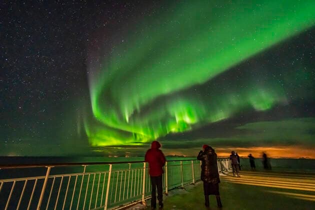 The Northern Lights from at sea when leaving the Lofoten Islands, Norway heading toward the mainlaind, from Stamsund to Bodo, March 3, 2019. This was from the Hurtigruten ship the ms Trollfjord. Orion is setting in the west at left. This is looking northwest. This display was with a Kp Index of only 1 or 2 and was active and bright only briefly around midnight. This is a single 1-second exposure for at f 2 with the 15mm Venus Optics lens and Sony a7III at ISO 6400. Copyright: xAlanxDyerx xVWPicsx ADY-2019-66