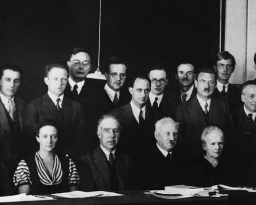 Physicists at the Seventh Solvay Physics Conference, Brussels, Belgium, October 1933. Seated, L-R: Irene Joliot-Curie, Niels Bohr, Abram Ioffe, Marie Curie. Standing, L-R: no ID, Werner Heisenberg, Hendrik Kramers, Ernest Stahel, Enrico Fermi, Ernest Walt For usage credit please use; PUBLICATIONXNOTxINxCANxCHNxFRAxITAxJPNxNORxPOLxRUSxESPxUKxUSA Copyright: xCourtesyxEverettxCollectionx HISL039 EC579