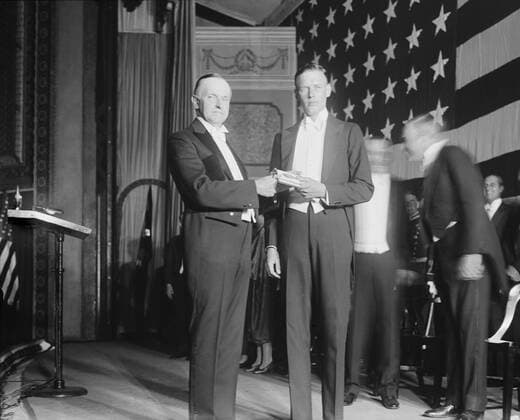 President Calvin Coolidge presents Charles Lindbergh with Congressional Medal of Honor. Nov. 1927. Lindbergh was a Captain in the U.S. Army Air Corps Reserve when he made his New York City to Paris flight on May 20-21, 1927. (BSLOC_2015_15_144) For usage credit please use; PUBLICATIONXNOTxINxCANxCHNxFRAxITAxJPNxNORxPOLxRUSxESPxUKxUSA Copyright: xCourtesyxEverettxCollectionx HISL040 EC676