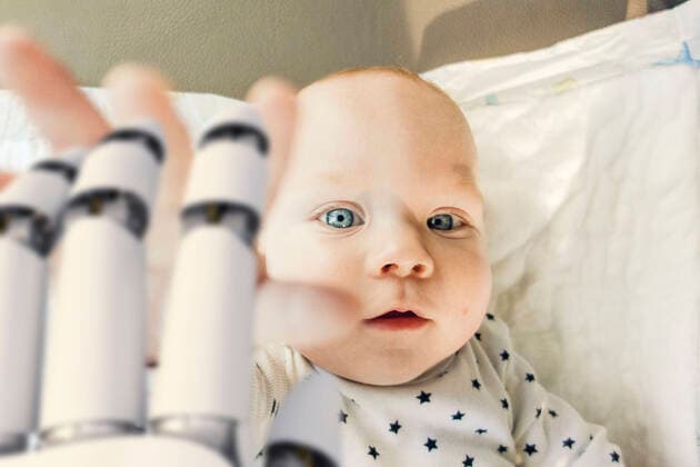 Portrait of baby boy reaching for robot hand model released Symbolfoto property released  KSHSF00019