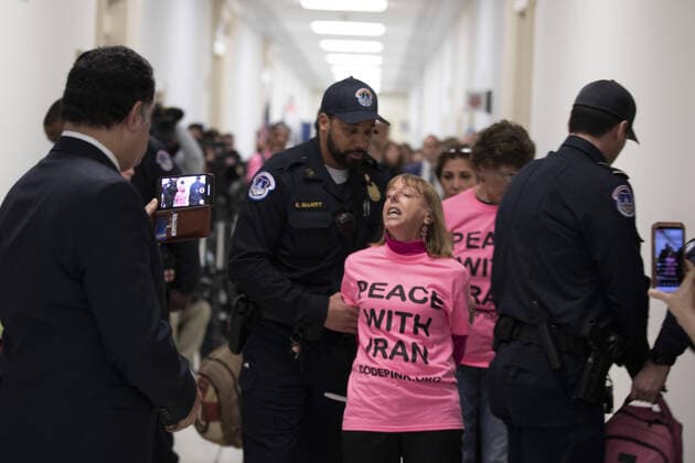 2020 Bilder des Jahres, News 02 Februar News Themen der Woche KW09 News Bilder des Tages Protesters are escorted out as Secretary of State Mike Pompeo testifies at the House Foreign Affairs Committee on Capitol Hill in Washington, D.C. on Friday, February 28, 2020.  WAP20200128019 TASOSxKATOPODIS