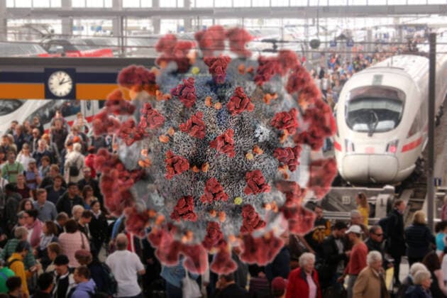 (FOTOMONTAGE) Symbolbild zur Ausbreitung des Coronavirus in Deutschland: Virus mit Menschenmenge auf einem überfüllten Bahnsteig im Hauptbahnhof München, Bayern, Deutschland