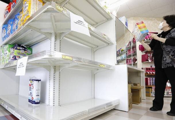 New coronavirus Photo taken Feb. 29, 2020, shows toilet paper almost gone from shelves at a drugstore in Sendai, northeastern Japan. Many supermarkets and drugstores in Japan have run short of the product due to panic buying on fears it will follow face masks in selling out amid the spread of the coronavirus. 