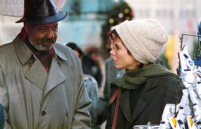 Weihnachten, Filmreife Outfits WHILE YOU WERE SLEEPING, from left: Jason Bernard, Sandra Bullock, 1995, Ã‚Â© Buena Vista courtesy Everett Collection Â©Buena Vista Pictures Courtesy Everett Collection PUBLICATIONXNOTxINxCANxCHNxFRAxITAxJPNxNORxPOLxRUSxESPxUKxUSA Copyright: xÃ‚Â©BuenaxVistaxPictures CourtesyxEverettxCollectionx M8DWHYO EC004