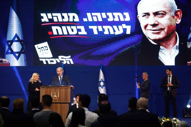(200303) -- TEL AVIV, March 3, 2020 (Xinhua) -- Israeli Prime Minister Benjamin Netanyahu (2nd L) speaks at Likud Party election campaign headquarters in Tel Aviv, Israel, on March 3, 2020. Israeli Prime Minister Benjamin Netanyahu s Likud party won the largest number of seats in the parliamentary elections, but apparently fell short of a majority needed to form a government, exit polls showed Monday. (Gideon Markowicz JINI via Xinhua) ISRAEL-TEL AVIV-ELECTION-NETANYAHU 
