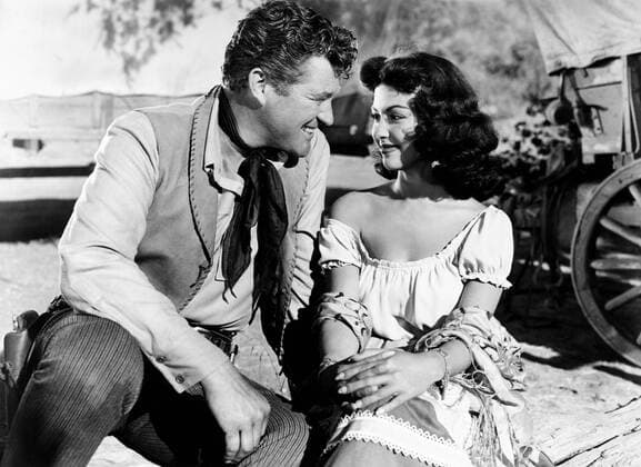 CATTLE TOWN, from left, Dennis Morgan, Rita Moreno, 1952 Courtesy Everett Collection PUBLICATIONXNOTxINxCANxCHNxFRAxITAxJPNxNORxPOLxRUSxESPxUKxUSA Copyright: xCourtesyxEverettxCollectionx MBDCATO EC013