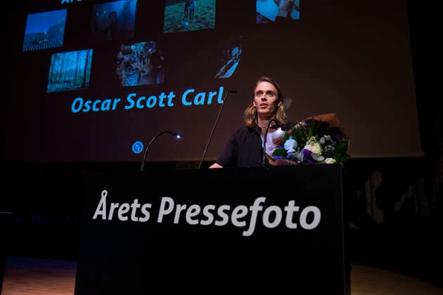 Oscar Scott Carl modtager prisen for aarets reportage, Danmark. AArets Pressefoto 2019 priser uddelses i den Sorte Diamant i Koebenhavn fredag den 6. marts 2020. , Copenhagen Denmark Copyright: MartinxSylvestx cop102 spdk20200306-161718-L