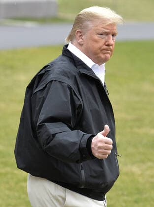 President Donald Trump gives a thumbs up to the press as he departs the White House, Friday, March 6, 2020, in Washington, DC. Trump is stopping in Tennessee to view tornado damage before continuing on to his estate at Mar-a-Lago, Florida for the weekend.  WAP20200306502 MIKExTHEILER