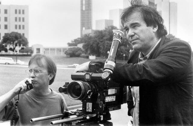 JFK, director Oliver Stone (right), on location, 1991. Ã‚Â©Warner Brothers courtesy Everett Collection Â©Warner Bros Courtesy Everett Collection PUBLICATIONXNOTxINxCANxCHNxFRAxITAxJPNxNORxPOLxRUSxESPxUKxUSA Copyright: xWarnerxBros CourtesyxEverettxCollectionx MBDJFKK EC010