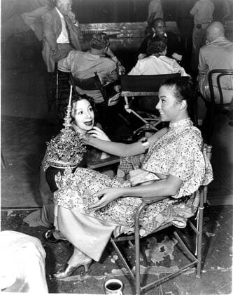 THE KING AND I, Rita Moreno, on-set, 1956, 20th Century Fox, TM & Copyright courtesy Everett Collection Â©20thCentFox Courtesy Everett Collection PUBLICATIONXNOTxINxCANxCHNxFRAxITAxJPNxNORxPOLxRUSxESPxUKxUSA Copyright: x20thCentFox CourtesyxEverettxCollectionx MBDKIAN FE044