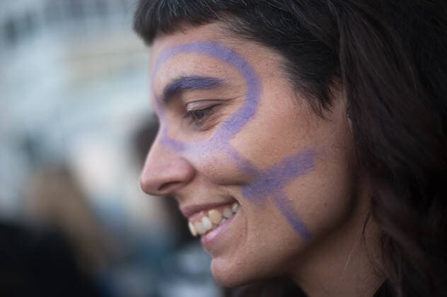 March 8, 2020, Malaga, Spain: A woman with her face painted with a feminist symbol during the demonstration..General women strike, every 08 March coinciding with the International Women s Day, thousands of people around the world take the streets to protest against violence on women. They also demand real gender equality between men and women. Malaga Spain - ZUMAs197 20200308_zaa_s197_251 Copyright: xJesusxMeridax