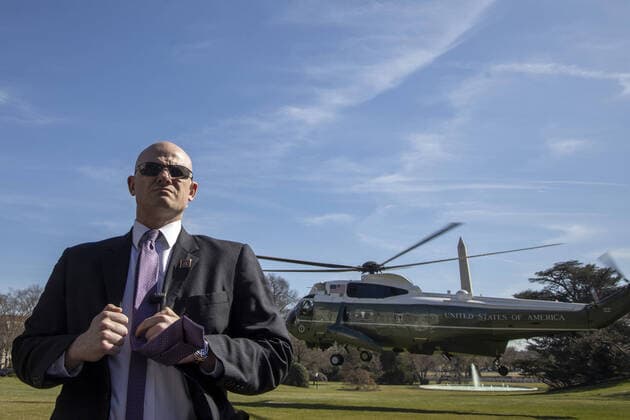 A Secret Service agent stands by as Marine One, carrying President Donald Trump lands on the South Lawn at the White House in Washington, D.C. on Monday, March 9, 2020. Trump is returning from a weekend trip to Florida and Atlanta where he visited the CDC.  WAP20200309002 TASOSxKATOPODIS